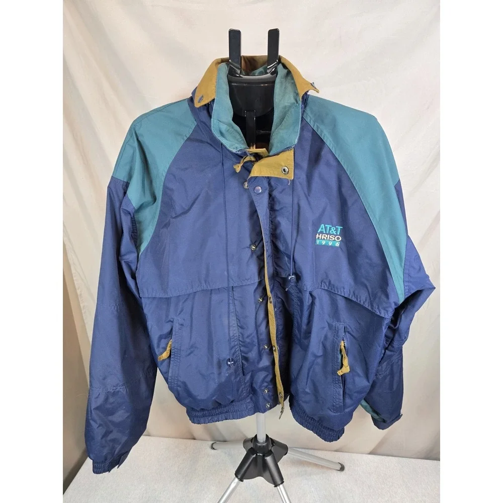 vintage 1996 AT&T Hriso nylon windbreaker jacket in a navy blue and teal...